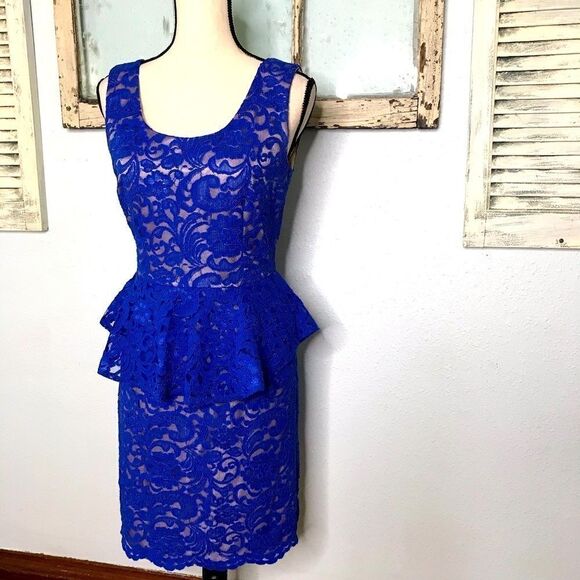 Beautiful Lace Peplum Dress by Explosion - Picture 3 of 13